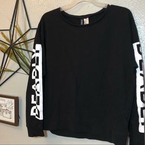 Black “deadly” sweater loose fitting